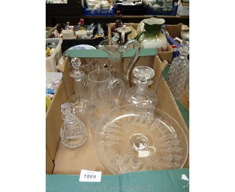 A box of cut glass including two etched glass jugs (one marked Dr. Gould), a Stuart Crystal decanter plus one other decanter 