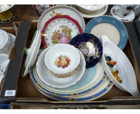 Four meat plates to include; Barretts, Adderleys and Royal Worcester (the largest plate cracked), along with a German fruit s