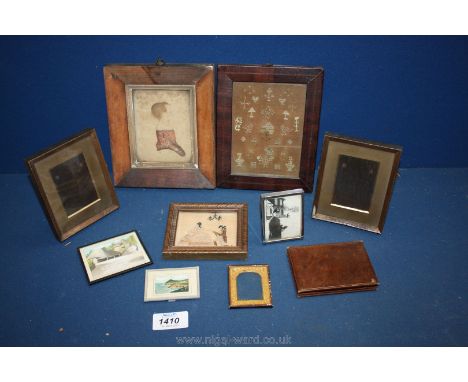 A small box of old miniature pictures, embroideries, tapestry picture of a little girl etc.