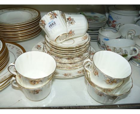 ***A Royal Doulton 'Belmont' part tea and dinner service comprising  six cups, thirteen saucers, eleven tea, eight side and s