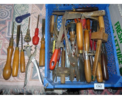 A tray of tools including woodworking chisels, saws, hammers, hole maker, Stanley knife, etc.