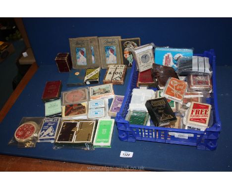 A large quantity of playing cards and bridge cards