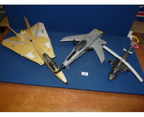 Three model Aircraft including Hasbro Sky Striker, Hasbro X-30 plane and an Universal Studios Ertl 'Airwolf' helicopter.