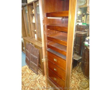 A good quality Edwardian cross-banded and light/dark wood strung Mahogany triple Wardrobe having to the left a flight of thre