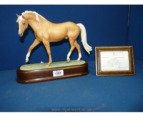 ****   A Doris Lindner Royal Worcester figure of a Palomino horse with certificate, no. 536 of ***750 (Not 500)***.