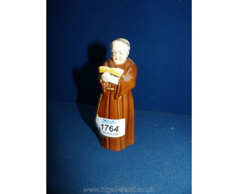 A Royal Worcester monk candle snuffer.