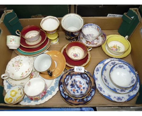 A box of mixed trio tea sets including Radford yellow/white, Aynsley red/gold, Wedgwood plate white with embossed blue edging