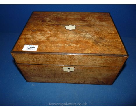 A ladies vanity Box with mother of pearl shield to the lid, silk lined interior with two corner pockets.   