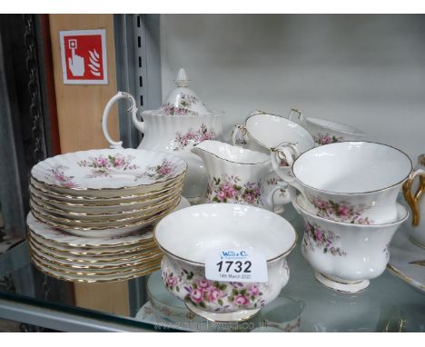 A Royal Albert 'Lavender Rose' Teaset including teapot, milk jug, sugar bowl, six cups and six saucers and side plates, plus 