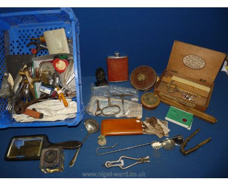 A quantity of miscellanea including Chesterman's tape measure, folding rulers, corkscrews, souvenir photos, hip flask, etc.