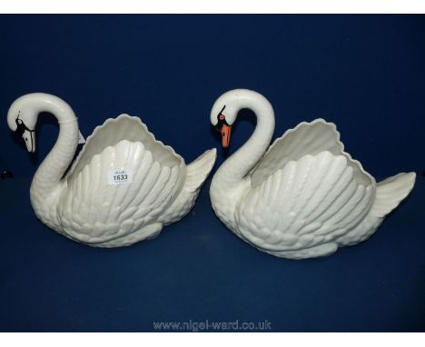 A pair of Dartmouth ceramic large swan shape flower containers each 14" long x 12" tall, marks to base.