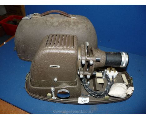 An old Aldis projector in a metal case.