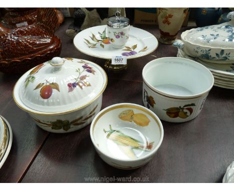 A small quantity of Royal Worcester Evesham pattern china including; a stemmed cake plate, a tureen &amp; lid, a souffle dish