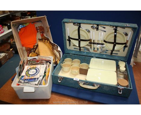 A vintage Picnic Hamper 'Sirram' blue case with cream plastic ware, quantity of Beer Mats and quantity of Irish linen