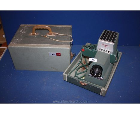 An Argus slide projector, boxed,