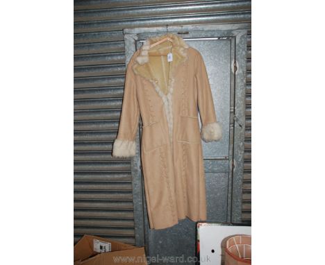 A ladies long sheepskin Coat, light beige, size 44.