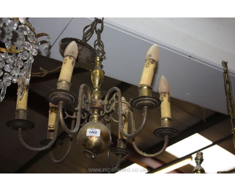 A brass six branch light fitting.