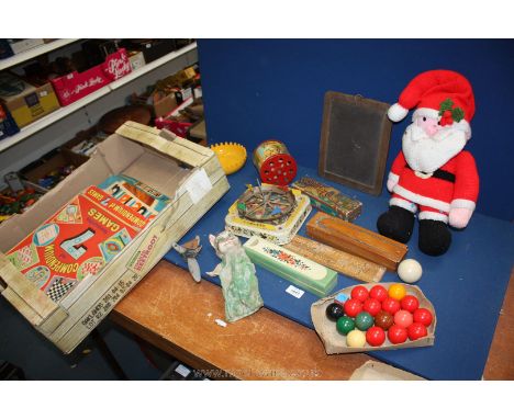 A box of vintage games and toys to include Sooty, hand puppet, pool balls, Dominoes, box of playing cards, woollen Father Chr