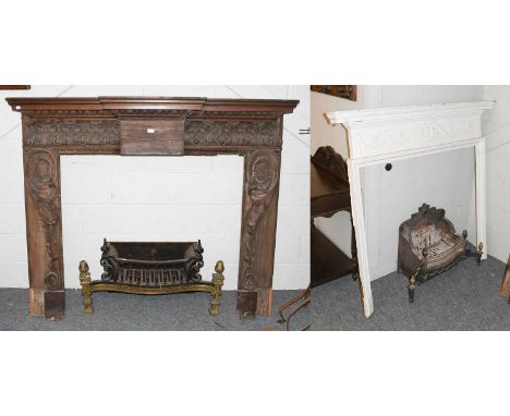 A Neo Classical Gilt Brass and Cast Iron Fire Grate, 96cm wide; together with a carved oak break front fire surround decorate