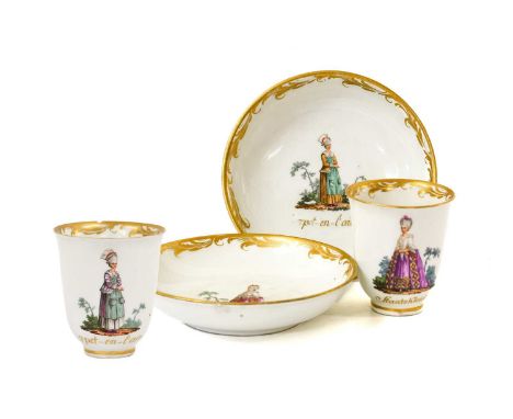 A Pair of Vienna Porcelain Coffee Cups and Saucers, circa 1770, painted with elegant ladies, titled Staatskleid and Pet-en-l'
