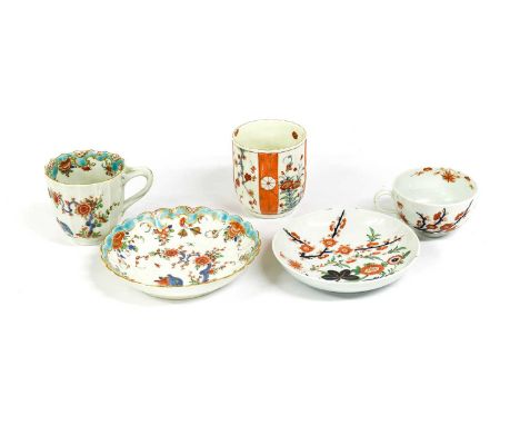 A Worcester Porcelain Facetted Cup and a Fluted Saucer, circa 1770, painted in the Kakiemon style with the "Two Quail" patter