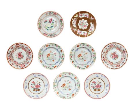 Three Chinese Porcelain Plates, Qianlong, each painted in famille rose enamels with a vase of flowers and precious objects un