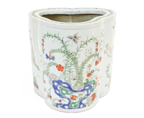 A Chinese Porcelain Planter, Qing Dynasty, of trefoil shape, painted in famille verte enamels with a dignitary riding in a co