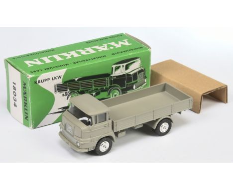 Marklin 8034 Krupp Open Back Truck - grey including chassis, cast hubs - Near Mint in a generally Good carded picture box. 