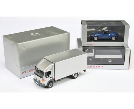J-Collection a group of (1/43rd scale) Nissan models (1)&nbsp; Nissan 3Atleon Rigid Truck - silver (2) Nissan Cabstar Open ba