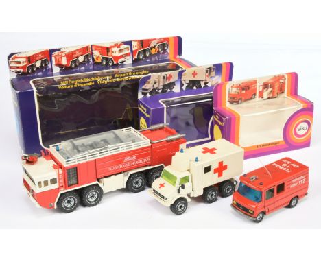 Siku, a mixed boxed group of commercial vehicles (German issues) to include, (1) Siku 3411 Airfield Firetruck (2) Siku 2218 U