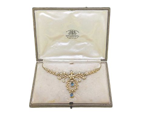 An aquamarine and split pearl necklace, floral centrepiece with two rubover set pear-shaped aquamarine droppers, approximatel