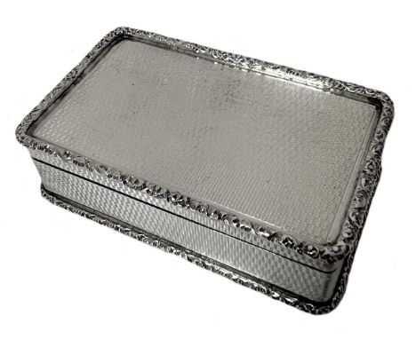 An Elizabeth II silver snuff box, mark of Peter John Doherty, Birmingham 1986, of rectangular form, decorated all over with e