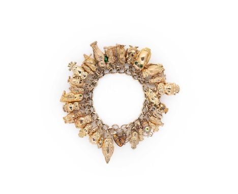 A late 20th century charm bracelet, filed curb links, suspending forty one owl charms, hallmarked or assessed as 9ct gold, pa