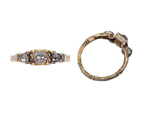 An early 18th century diamond set mourning ring, circa 1737, central old mine cut diamond within a reeded closed back setting