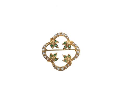 An emerald and split pearl quatrefoil brooch, foliate design set with round faceted emeralds, and a graduated split pearl bor