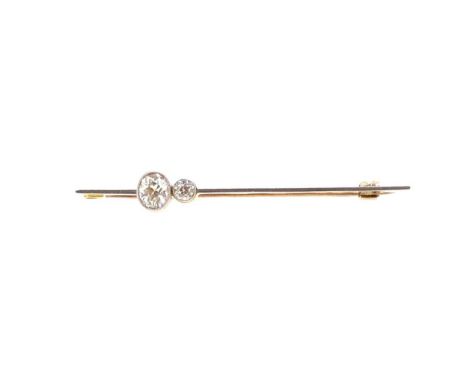 A diamond set bar brooch, rubover set oval shaped old brilliant cut diamond, estimated approximate weight 0.50ct, further set