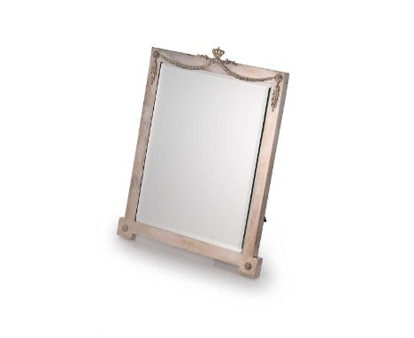An Edward VII silver framed easel backed dressing table mirror, mark of the Goldsmiths' &amp; Silversmiths' Company Ltd., Lon