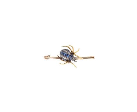 A sapphire and diamond spider brooch, realistically formed, the abdomen set with three rows of graduating oval and round face