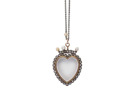 A Victorian rock crystal, diamond and pearl heart pendant, Circa 1890, a heart shaped slice of rock crystal, surrounded by a 