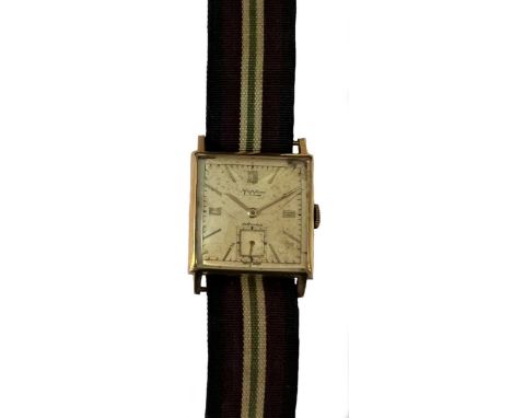 Movado for Mappin &amp; Webb, - A 9ct gold wristwatch, circa 1939, the tandem signed square silvered dial, 23cm wide, with go