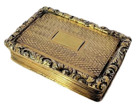 A George III silver gilt vinaigrette, mark of Nathaniel Mills, Birmingham 1828, of rectangular form, engine turned engraved d