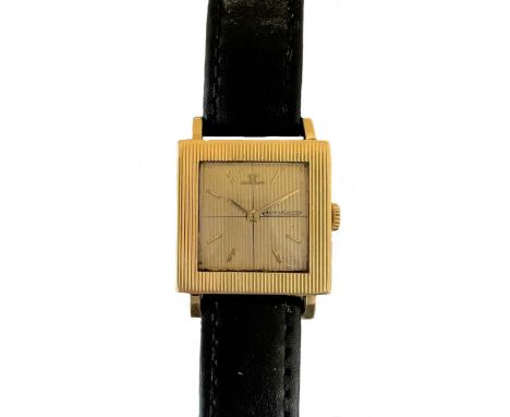 Jaeger-LeCoultre - An 18ct gold wristwatch,  circa 1963, model number 907634, the signed square striped champagne 'crosshairs