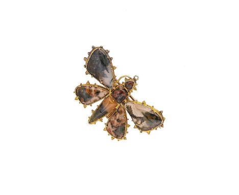 An agate butterfly brooch, realistically formed, with polished slices of agate, yellow metal frame with beaded detail, pin an
