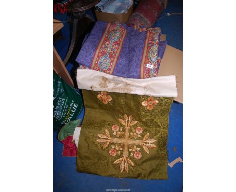 A box of fabric including curtains with tie backs, needlework, etc.