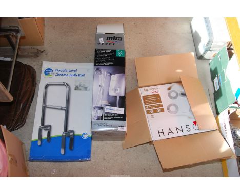 A Mira shower unit, bath rail and weighing scales.