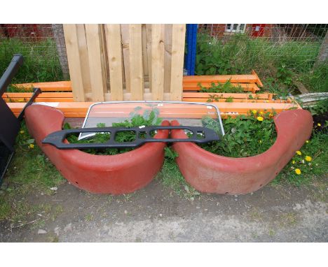 Vintage windscreen, mudguards and a dash.