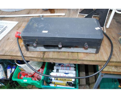 A two ring camping stove/grill.