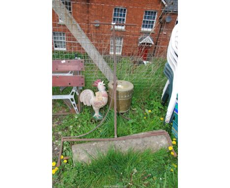 A stone garden roller 37" wide with Blacksmith made frame.