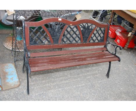 A garden bench with Cast Iron bench ends and back. 49 1/2" wide x 30" high.