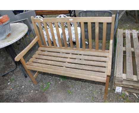 A garden bench, 43" wide x 34" high.